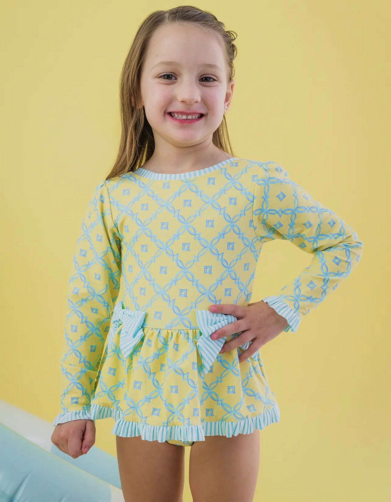 RuffleButts Banana Coastal Charm Long Sleeve Swimsuit