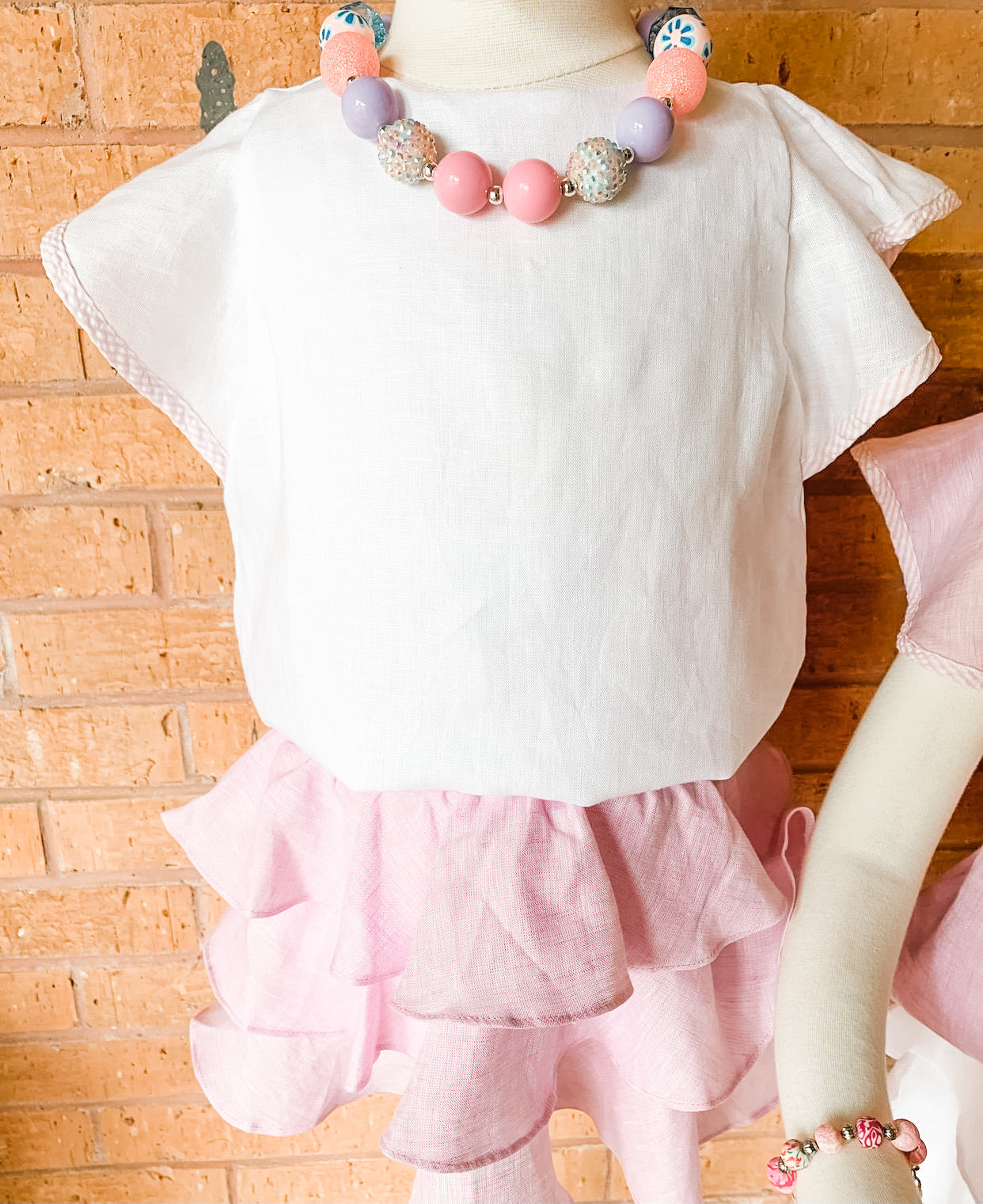 The White Ruffle Sleeve Top